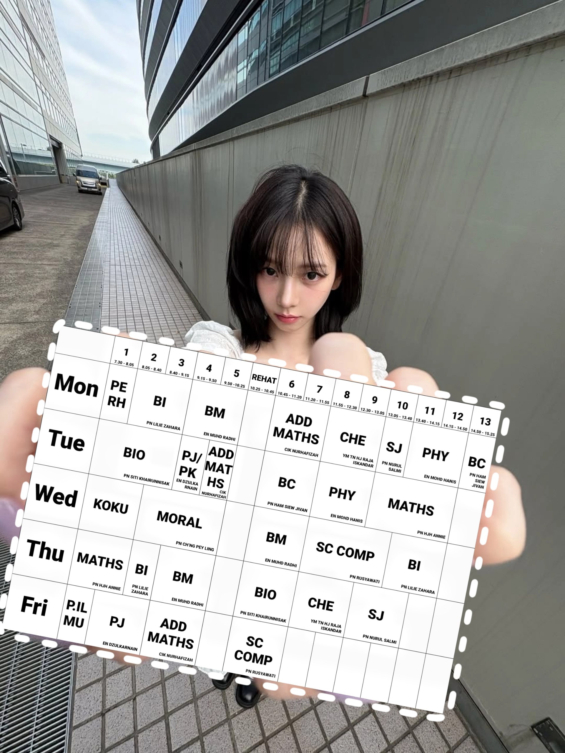 Person holding timetable